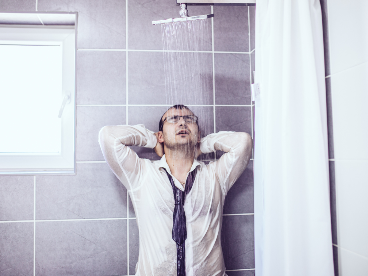 man in shower with public speaking nerves