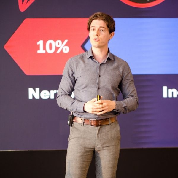 Ed Darling on stage at the CII conference coaching leaders in public speaking skills