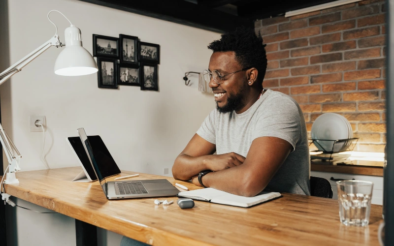 Man learning how to improve public speaking skills from home while giving a virtual presentation