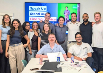 Team of professionals smiling after completing Project Charisma’s 1-day corporate speaker training workshop