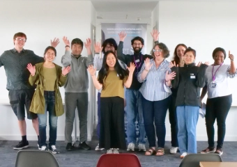 PhD students and faculty at University of Manchester Alliance Business School after completing Project Charisma public speaking training for higher education