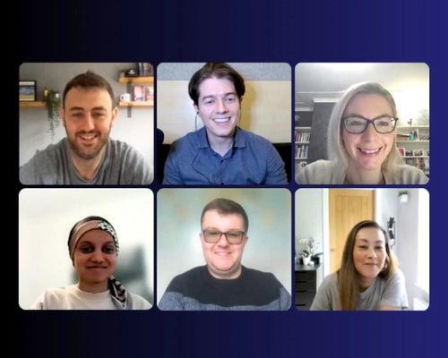 Ed Darling leading a virtual group training call as part of the Project Charisma 1-to-1 public speaking coaching programme, with participants smiling after practising speaking techniques